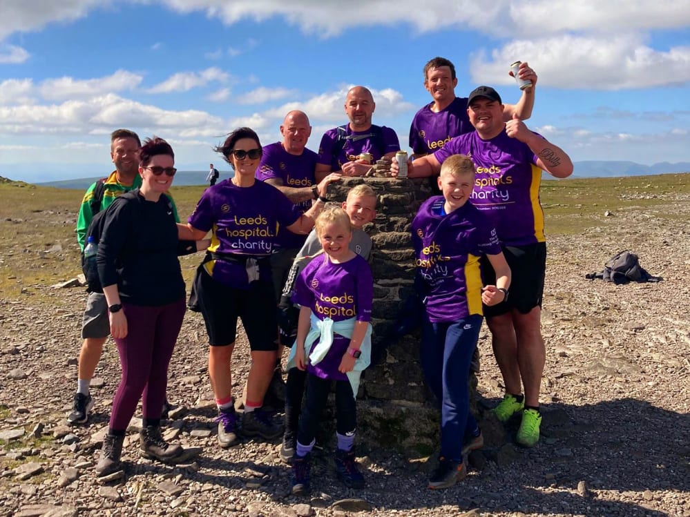 Group of people taking on the Yorkshire three peaks