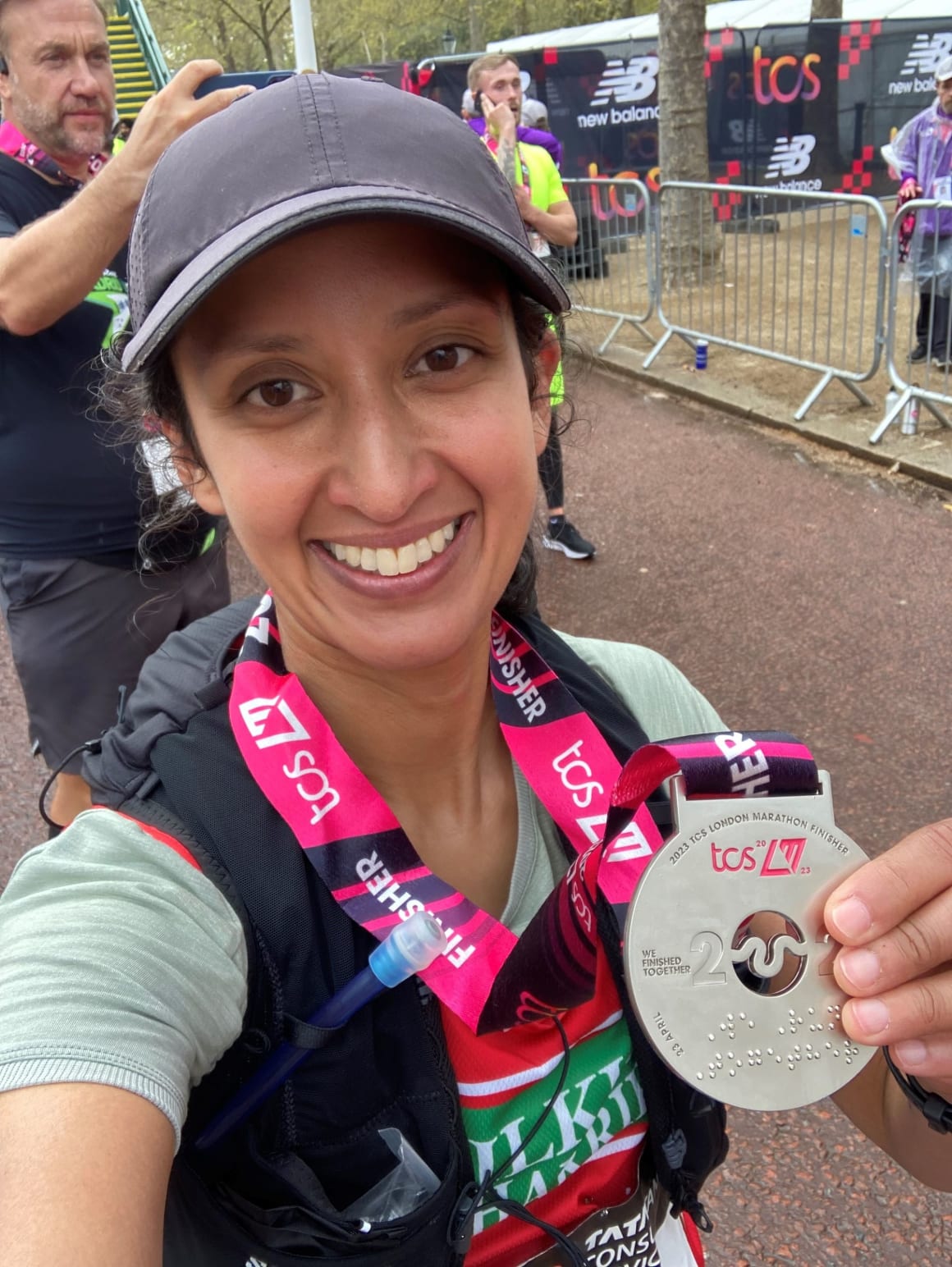 Rumana with her medal at the London Marathon
