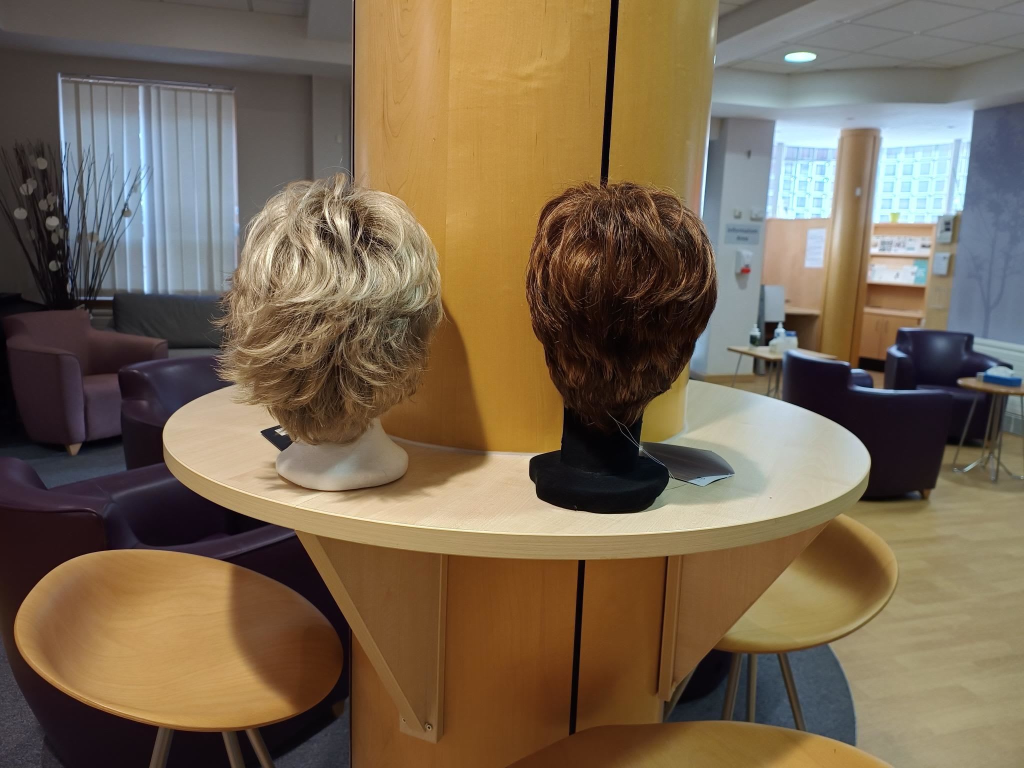 Blonde and brunette wig on mannequin head