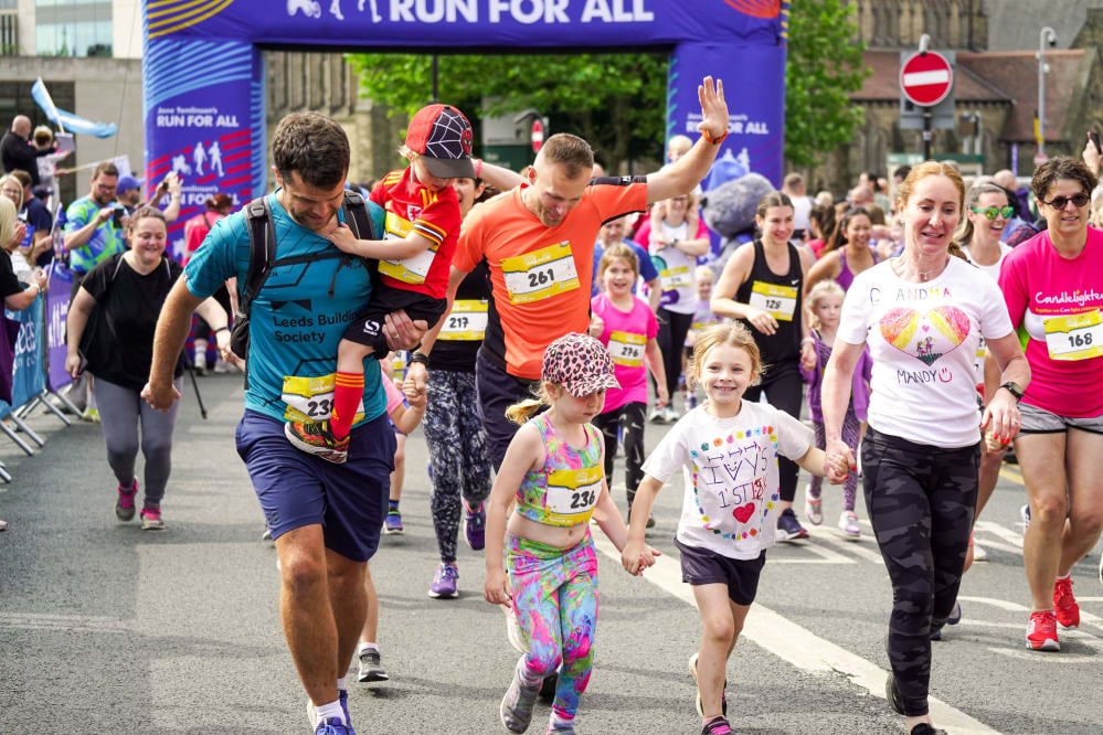 Families taking part in the Leeds Mini & Junior Run in 2023