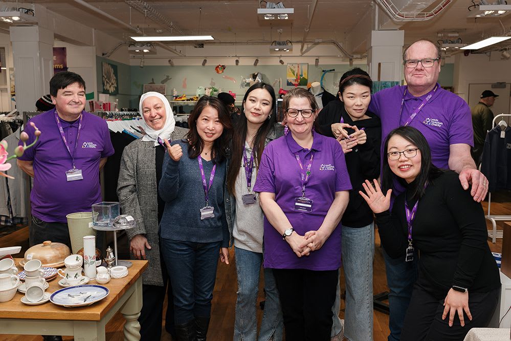 Volunteers pose outside the Merrion Centre Leeds Hospitals Charity Shop