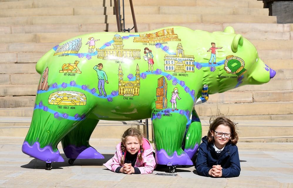 Pupils from Alwoodley Primary School pose with Hero Bear at the Leeds Bear Hunt Launch